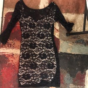 Woman’s black lace dress
